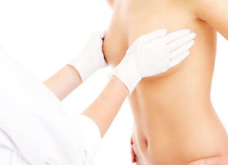 Doctor examining breast